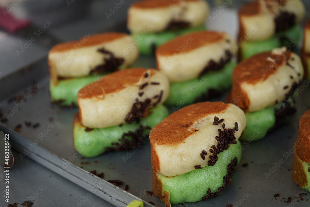Kue pukis is a cake made from flour dough and cooked in a special mold pan. This cake is made from a mixture of eggs, sugar, wheat flour, yeast and coconut milk. Kue pukis is a cake made from flour dough and cooked in a special mold pan. This cake is made from a mixture of eggs, sugar, wheat flour, yeast and coconut milk.