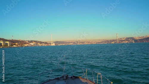 the boat floats on the marble sea towards the bridge in istanbul. view of the city of istanbul from a boat on the sea