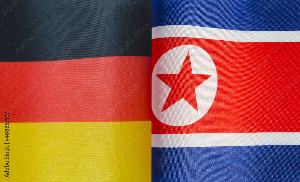 fragments of the national flags of Germany and the Democratic People's Republic of Korea close-up