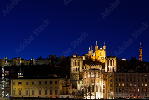 LYON, FRANCE, February 19, 2022 : Fourviere hill at the blue hour, with Saint-Jean Cathedral and Fourviere basilica.