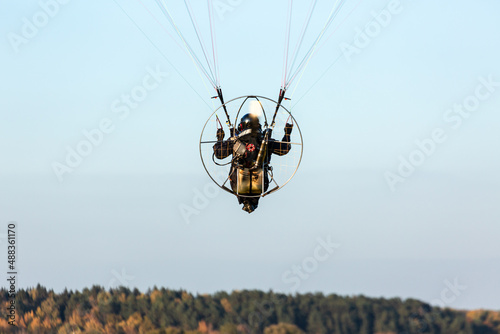 motor paraglider in the sky