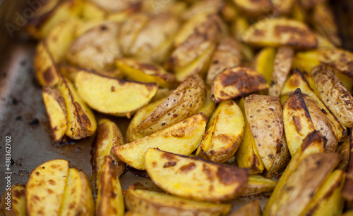 Potatoes. Potato wedges baked with spices