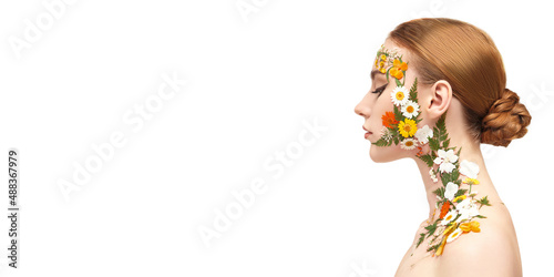 woman covered by flowers