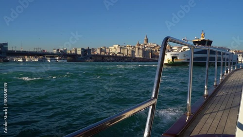 steel railings of the boat on the background of the city of istanbul. slow motion boat floats on the sea in sunny weather