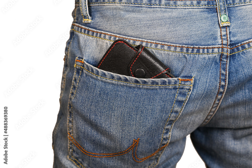 wallet in the back pocket of blue jeans.