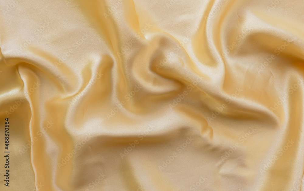 Abstract background luxury cloth. Yellow texture, Luxurious Christmas background. Elegant wallpaper design background Abstract background luxury cloth. Yellow texture, Luxurious Christmas background. Elegant wallpaper design background