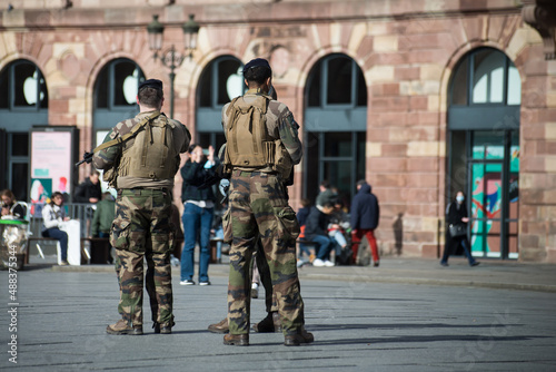 Strasbourg - France - 19 February 2022 - Portrait on back view of french military patroll in the street photo
