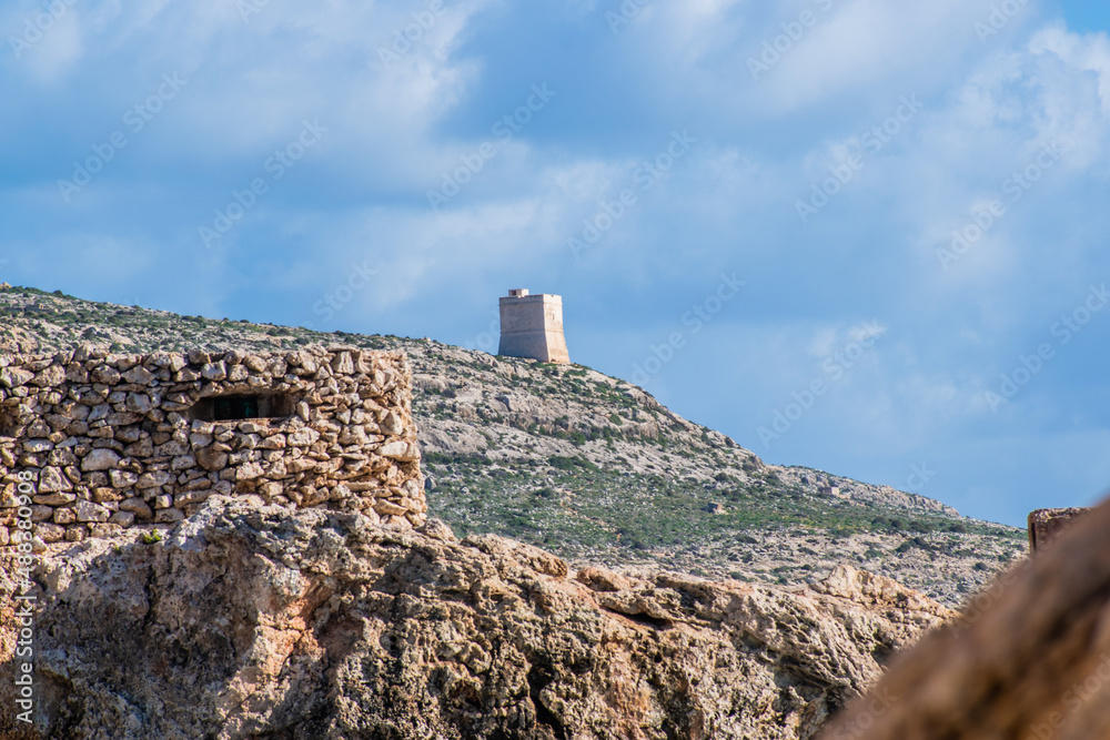 The Ħamrija Tower as seen from Għar Lapsi