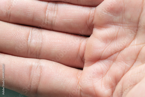 Macro human hand Macro image of the surface texture of the human palm Close up skin texture with wrinkles on body human Hand closeup view