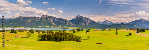 panoramic scene with rural landscape and mountain range in Bavaria, germany