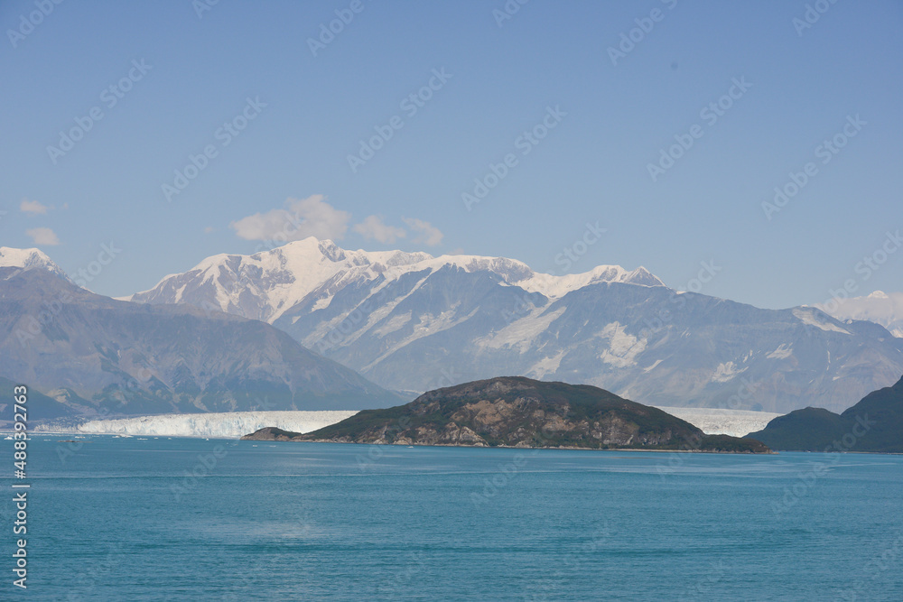 Landscape view of the ocean and snow-capped mountains of Alaska US.