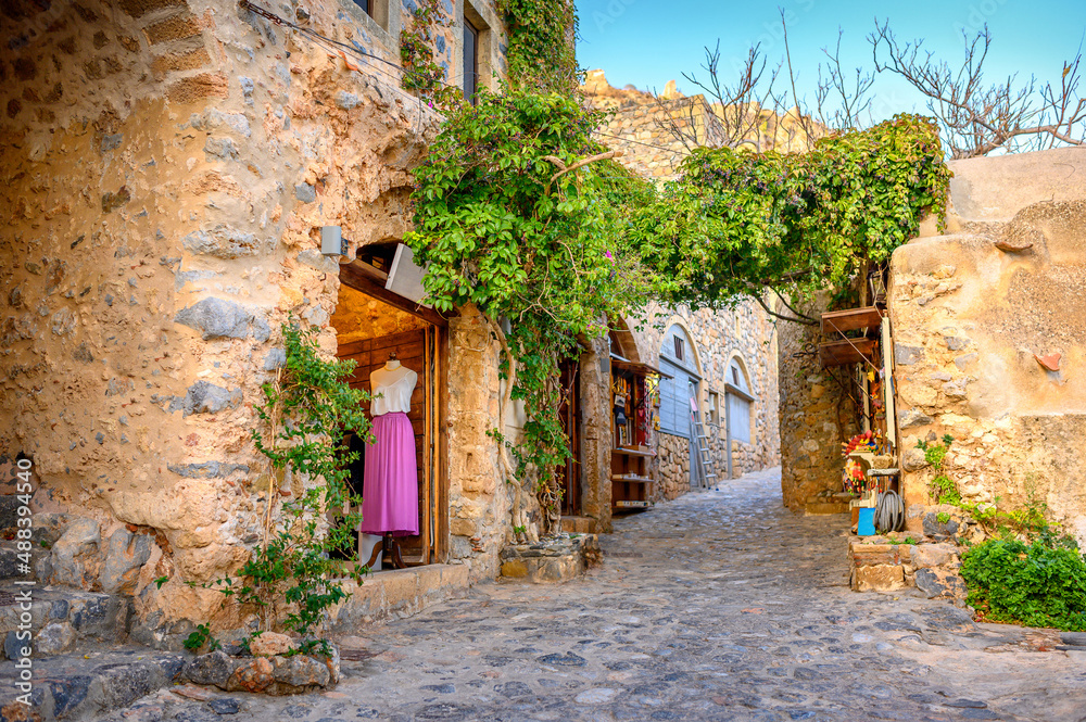 Beautiful street old medieval castle town of Monemvasia in Lakonia at sunrise, Peloponnese, Greece.