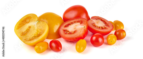 Fresh juicy tomatoes, isolated on white background.