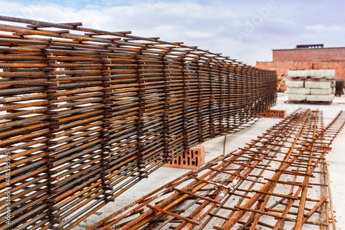 Rebar pile on top floor. Armature on Construction site. R einforcement for concreting. Laying rebar for concrete pour. Concrete building concept.