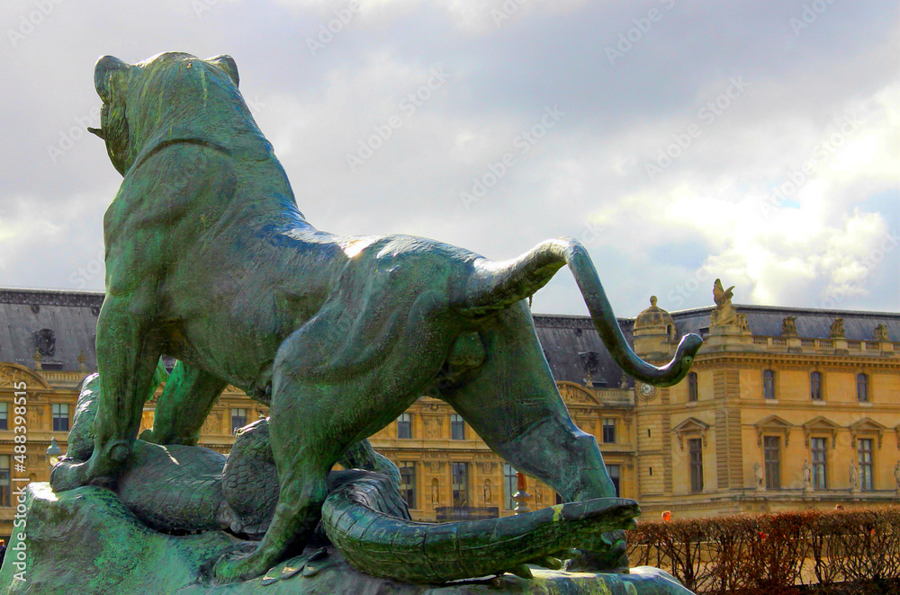 Paris. France.  Bronze figure of a lion and a crocodile in the French Tuileries Park.