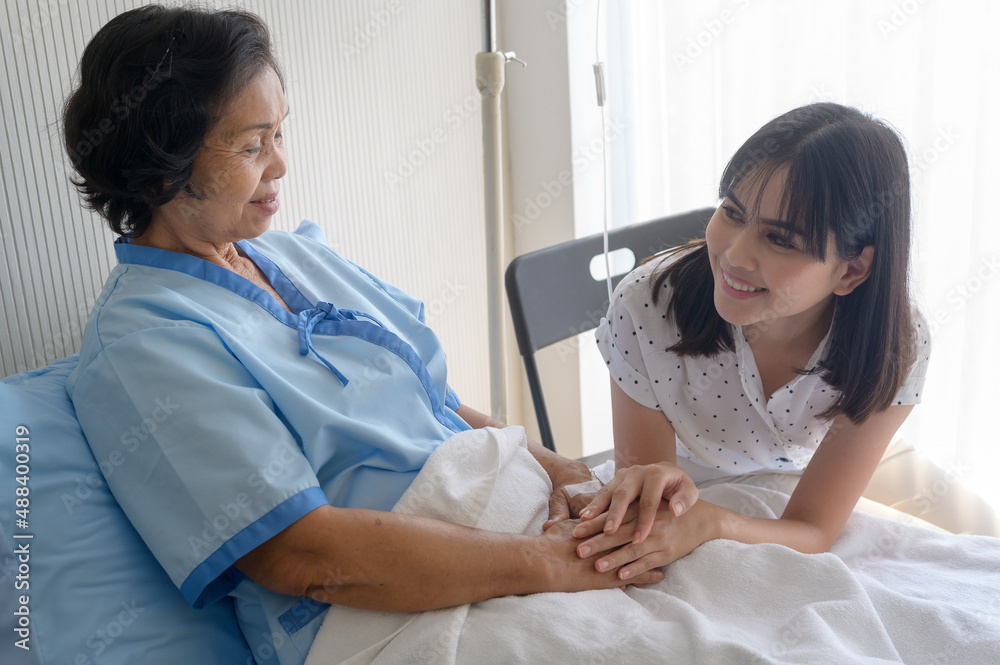 Senior patient woman and her supportive daughter in hospital, health and insurance concept. Senior patient woman and her supportive daughter in hospital, health and insurance concept.