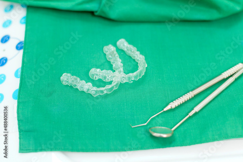 Close up dental tools in dental clinic with Invisalign , health care concept