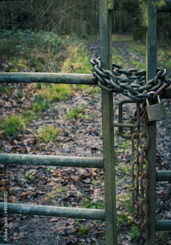 Secured gate with chain and padlock