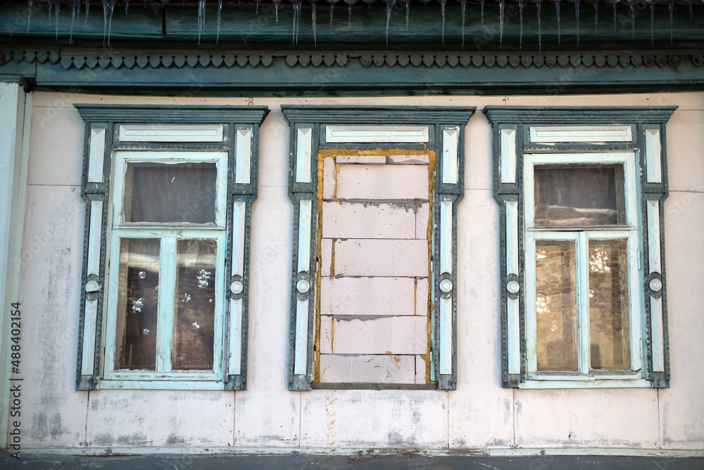 The windows of an old house in the historic center of Voronezh, Russia.