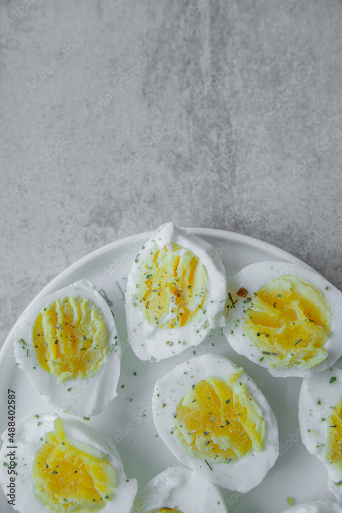 halves of a boiled eggs on a plate with space for text halves of a boiled eggs on a plate with space for text