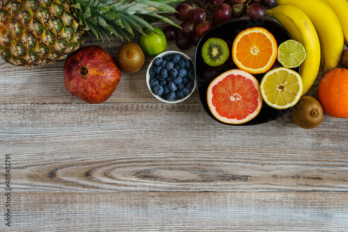 Fruits on a wooden table photo