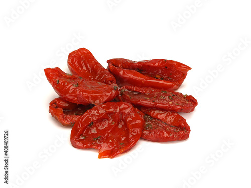 Sun dried tomatoes isolated on white background