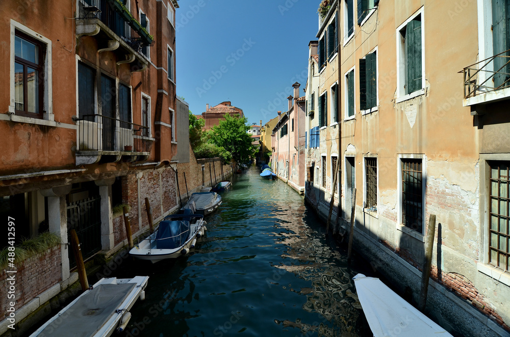 Venice, Italy, canals and historical buildings. Beautiful view of the streets and canals of Venice without tourists