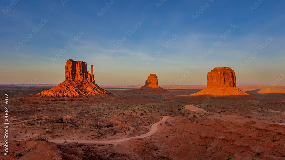 Sunset overlooking Mitten and Merrick Buttes at Monument Valley