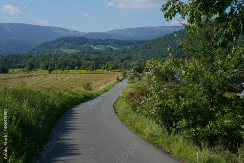 view of Karkonosze/ Giant Mountains in Poland from the village Ścieny in late summer