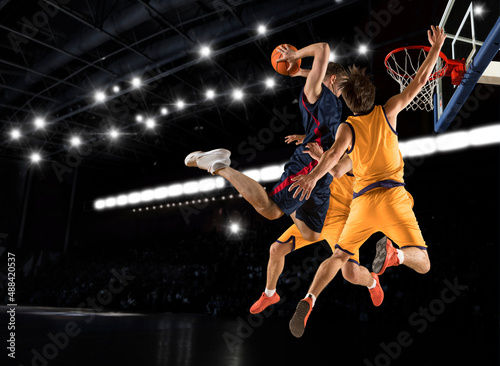 Three basketball player players in action © Andrey Burmakin