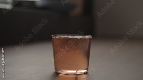 rhubarb drink in tumbler glass with copy space