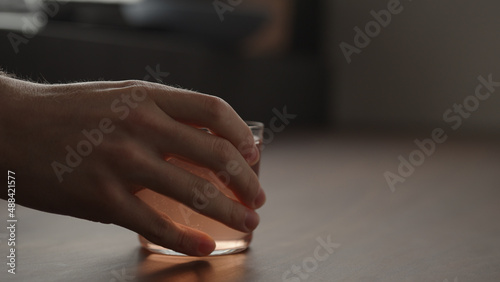 man hand take rhubarb drink in tumbler glass with copy space © GCapture