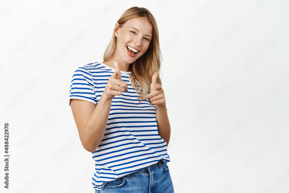 Congrats, you got this, nice job. Smiling happy blond woman pointing fingers at camera, choosing you, congratulating winner, inviting people to event, white background Congrats, you got this, nice job. Smiling happy blond woman pointing fingers at camera, choosing you, congratulating winner, inviting people to event, white background