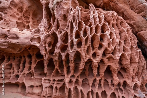 holes in stone - Tafoni weathering in red sandstone