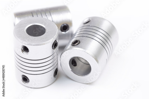Aluminum flexible cnc shaft couplings isolated above white background