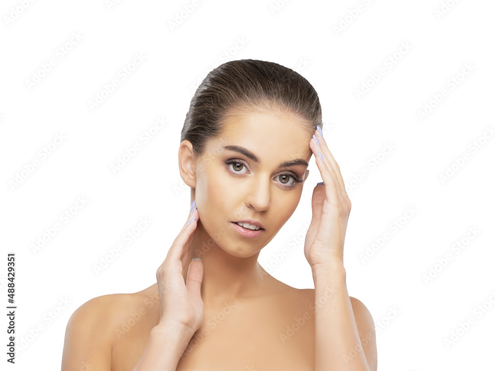 Studio portrait of a young, beautiful and healthy girl. Attractive female face isolated on white background.