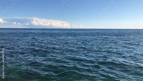 Blue surface of Mediterranean sea, light wind waves photo