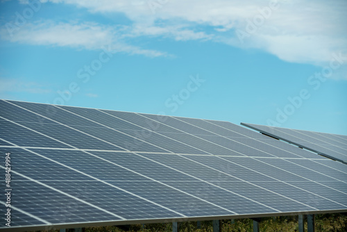 Field of solar panels to generate green and sustainable energy for the industries in the area.