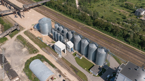 Grain Storage Silos next to Railway