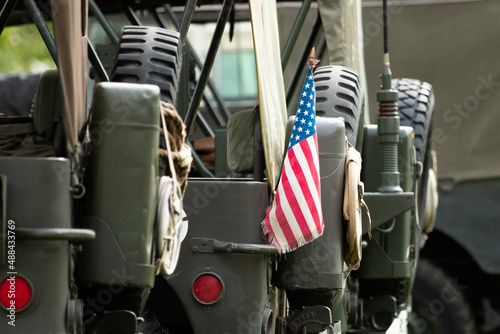 vintage world war 2 jeeps with American flag
