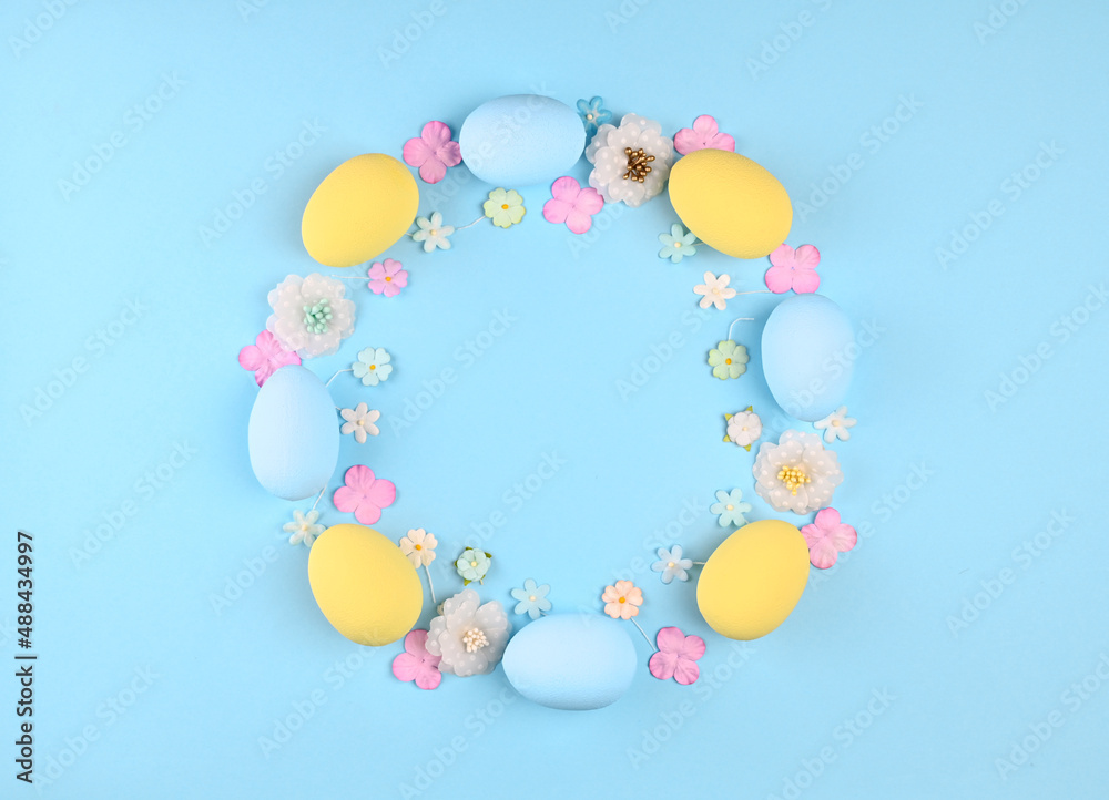 Easter wreath of colorful painted eggs and flowers Easter wreath of colorful painted eggs and flowers