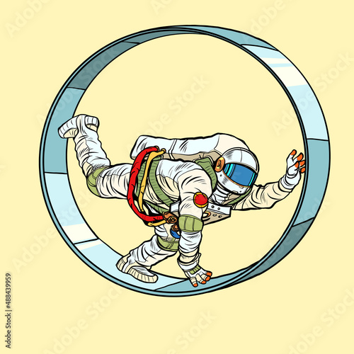 An astronaut in a squirrel wheel. Routine monotonous work. A man in captivity of his affairs