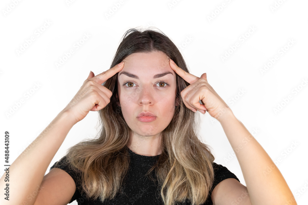 Young girl wants forehead liftmake plastic surgery. Labiaplasty. Medical operations. Facial Aesthetics. Isolated white background.
