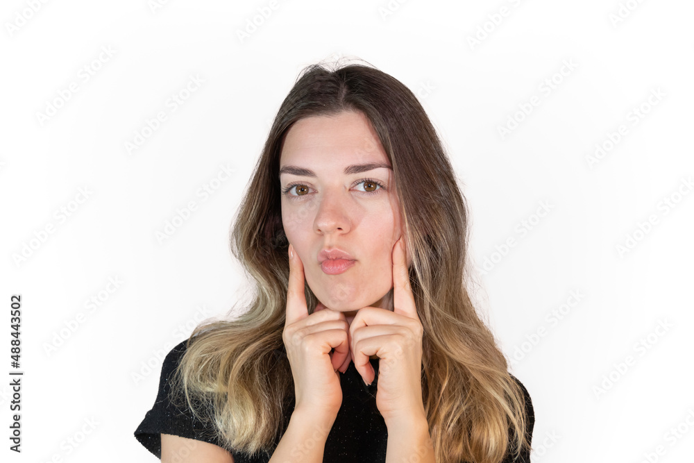 Young girl wants bichectomy operation. Aesthetic operation that will thin her facial structure. Buccal lipectomy. Young girl wants bichectomy operation. Aesthetic operation that will thin her facial structure. Buccal lipectomy.