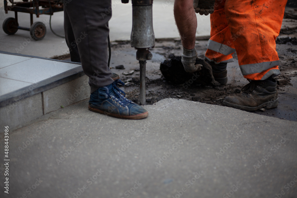 Road repair. Installation of curbs on the highway.