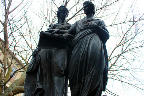 Vienna. Austria.  Sculpture of a man and woman in the Resselpark Park. photo