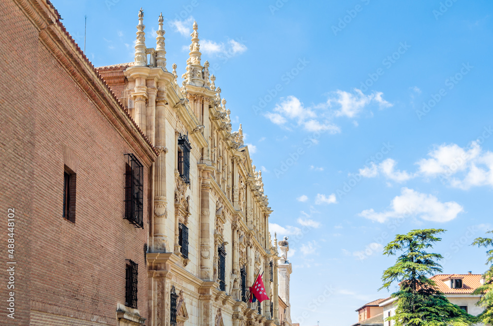 Church in Alcala de Henares with storks on the tower, Madrid province, Spain