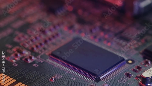 Shortage of chips in car manufacturing. High-tech production of electronic chips and electronic control boards.