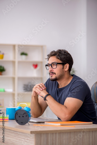 Young male designer working in the office