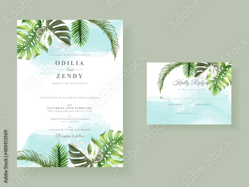 Beautiful tropical leaves wedding invitation card template